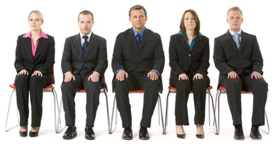 Group of people sitting on chairs